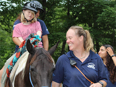 Girl riding a horse